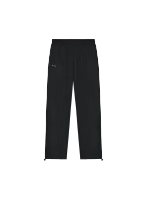 Mens DNA Recycled Nylon Track Pants—black